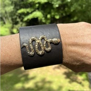 Black leather cuff bracelet with snake by Eva JeanBart LoRenzotti.